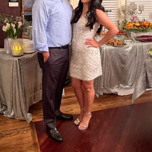 Fully bead and rhinestone mini dress.